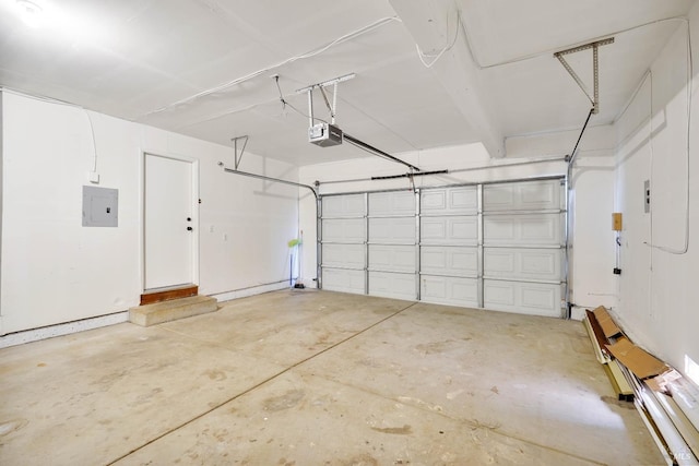 garage featuring a garage door opener and electric panel