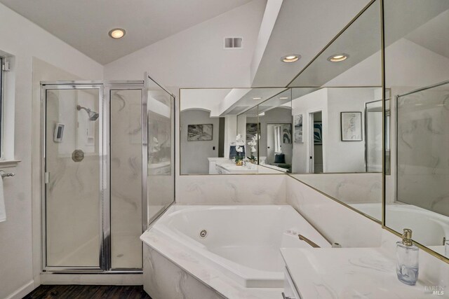 full bath with recessed lighting, visible vents, a jetted tub, and a stall shower