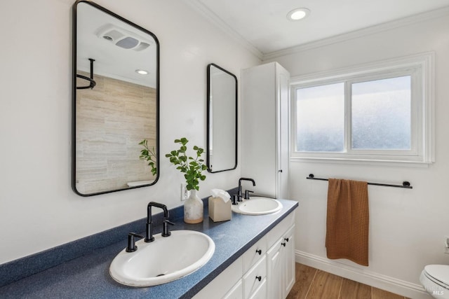 16 Tradewind Psge, Corte Madera, CA 94925 - full bathroom featuring crown molding, double vanity, a sink, and wood finished floors