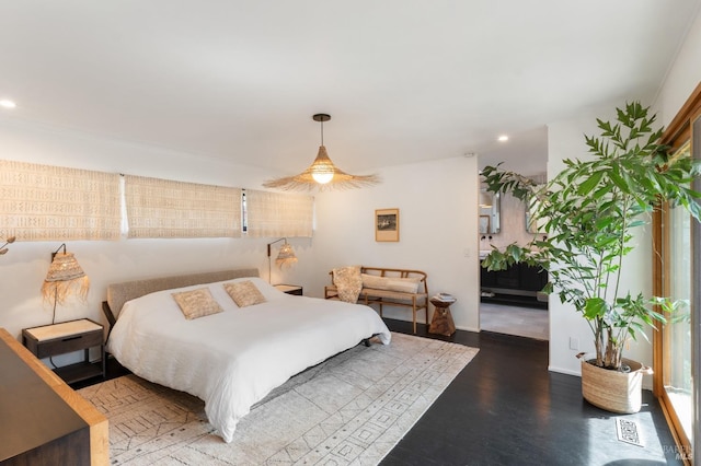 bedroom featuring baseboards, ceiling fan, recessed lighting, and wood finished floors