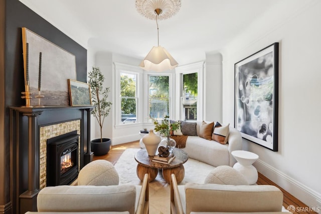 62 Walter St, San Francisco, CA 94114 - living area featuring wood finished floors, baseboards, and a tile fireplace