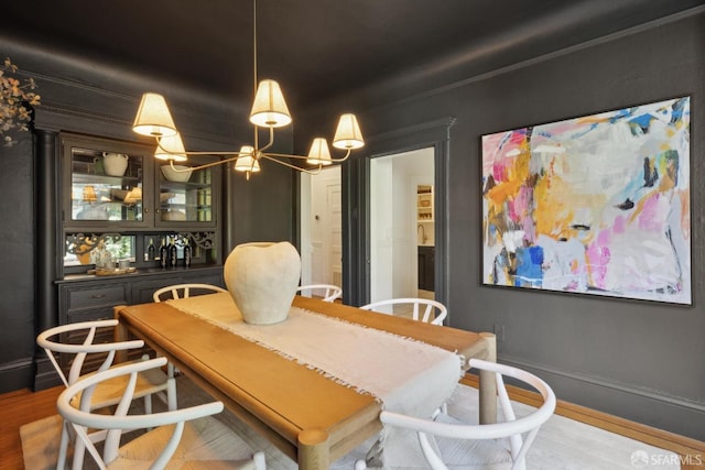 62 Walter St, San Francisco, CA 94114 - dining room featuring an inviting chandelier, baseboards, and wood finished floors