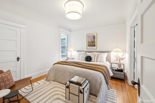 62 Walter St, San Francisco, CA 94114 - bedroom featuring baseboards, light wood-style flooring, and crown molding