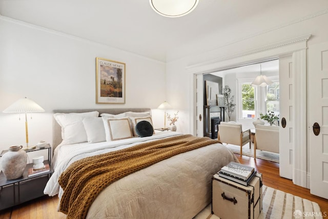 62 Walter St, San Francisco, CA 94114 - bedroom featuring ornamental molding and wood finished floors