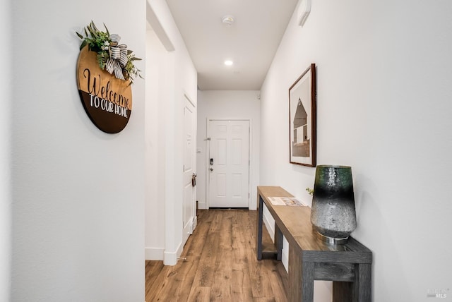 6067 Oak Leaf Pl, Rohnert Park, CA 94928 - hall with light wood-style flooring, baseboards, and recessed lighting