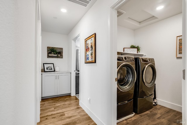 6067 Oak Leaf Pl, Rohnert Park, CA 94928 - laundry area with washer and dryer, wood finished floors, attic access, and baseboards