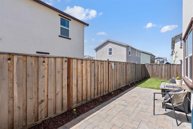 view of patio featuring a fenced backyard