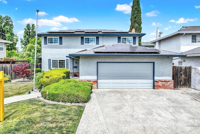 954 Coventry Ln, Fairfield, CA 94533 - traditional-style house featuring solar panels, stucco siding, driveway, fence, and a chimney