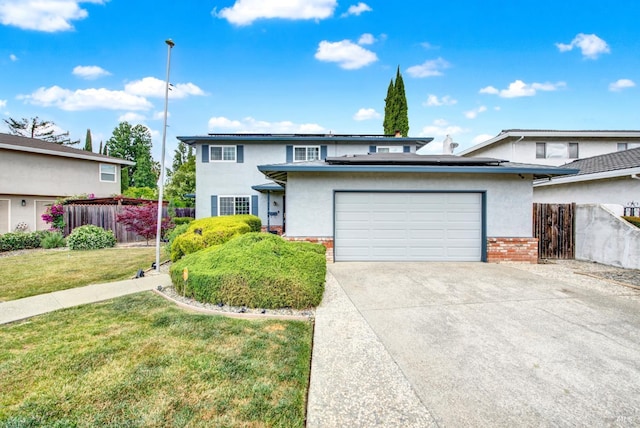 954 Coventry Ln, Fairfield, CA 94533 - traditional home featuring solar panels, an attached garage, concrete driveway, and stucco siding