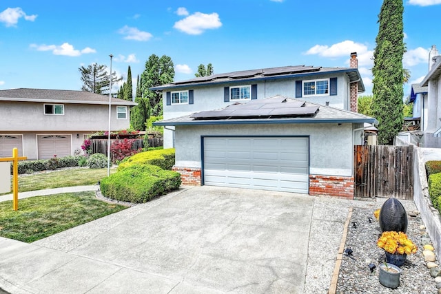 954 Coventry Ln, Fairfield, CA 94533 - traditional home featuring brick siding, solar panels, driveway, stucco siding, and a chimney
