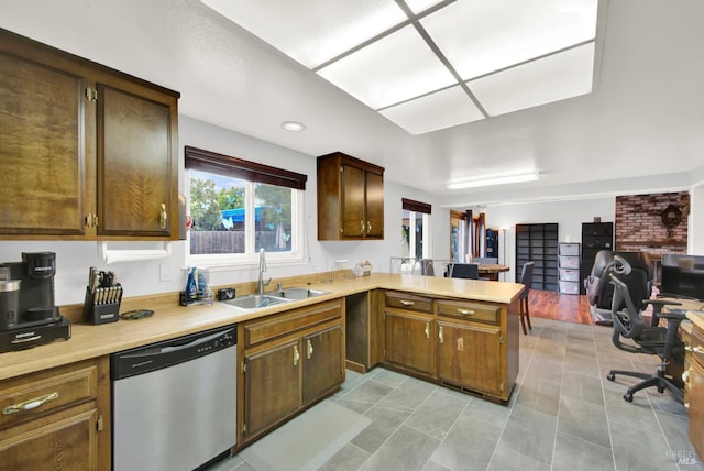 954 Coventry Ln, Fairfield, CA 94533 - kitchen with dishwasher, a sink, a peninsula, and light countertops