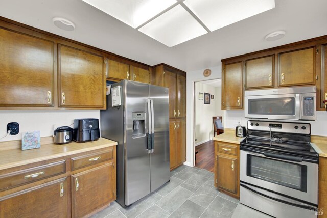 954 Coventry Ln, Fairfield, CA 94533 - living area with wood finished floors and a brick fireplace