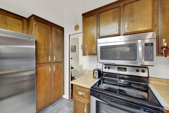 954 Coventry Ln, Fairfield, CA 94533 - kitchen with appliances with stainless steel finishes, light countertops, and brown cabinets