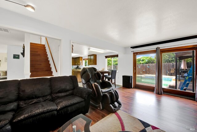954 Coventry Ln, Fairfield, CA 94533 - hallway featuring an upstairs landing, wood finished floors, a textured ceiling, and baseboards