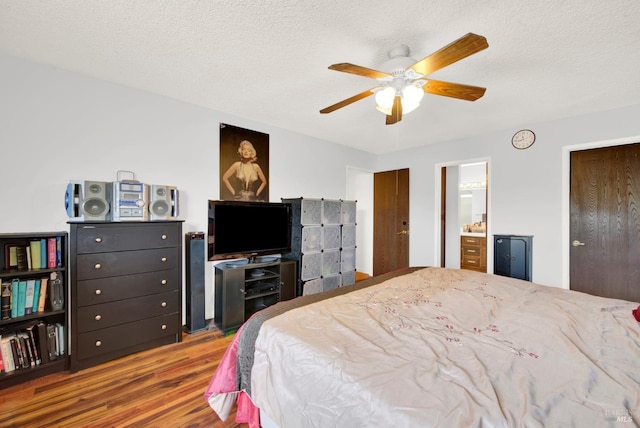 954 Coventry Ln, Fairfield, CA 94533 - bedroom with wood finished floors, ceiling fan, a textured ceiling, and ensuite bathroom