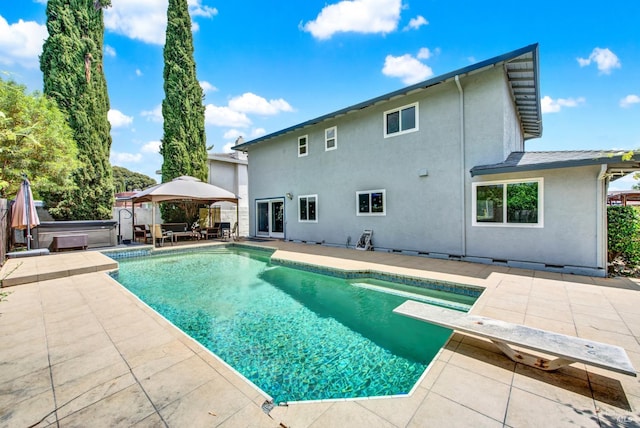 954 Coventry Ln, Fairfield, CA 94533 - outdoor pool with a covered hot tub, a patio, and a diving board
