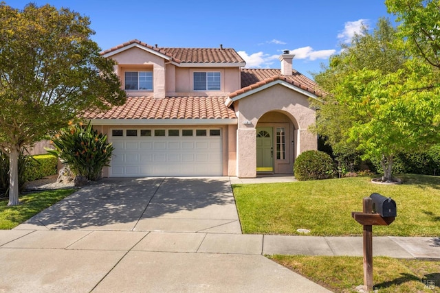 mediterranean / spanish-style home with a tiled roof, a chimney, a front lawn, concrete driveway, and stucco siding