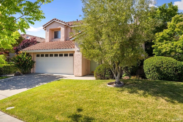 view of front of home with an attached garage, a tile roof, stucco siding, a front yard, and driveway