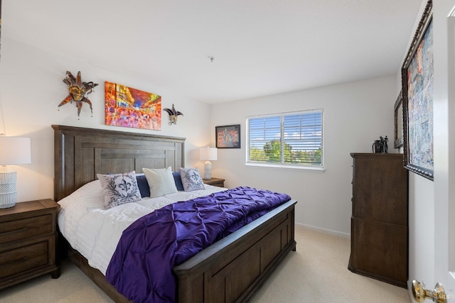 bedroom with light carpet