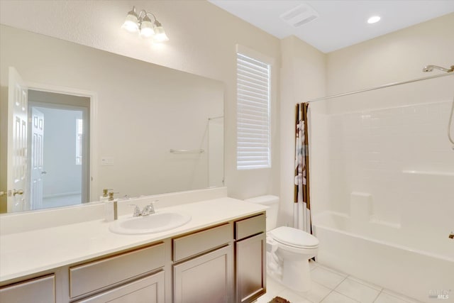 full bathroom featuring vanity, toilet, tile patterned floors, shower / bath combination with curtain, and visible vents
