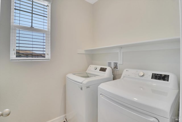 laundry area with laundry area and washing machine and clothes dryer