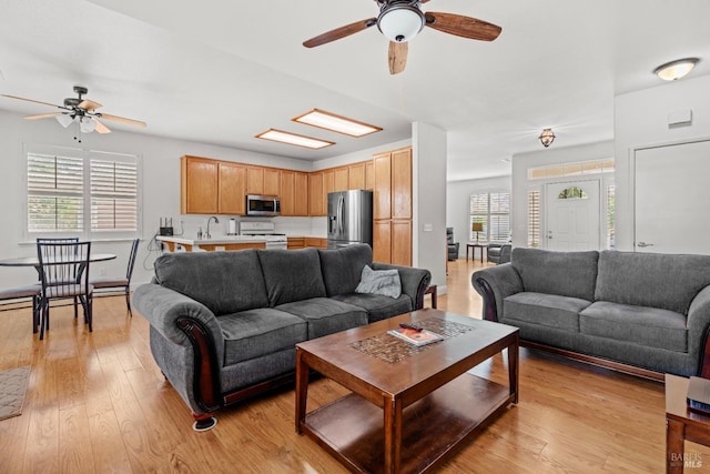 811 Inverness Dr, Rio Vista, CA 94571 - living area featuring light wood-style floors, a ceiling fan, and a wealth of natural light