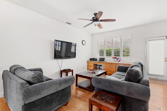 811 Inverness Dr, Rio Vista, CA 94571 - living room featuring a ceiling fan, visible vents, and light wood finished floors