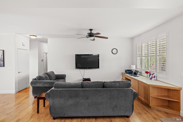 811 Inverness Dr, Rio Vista, CA 94571 - living area featuring baseboards, ceiling fan, and light wood finished floors