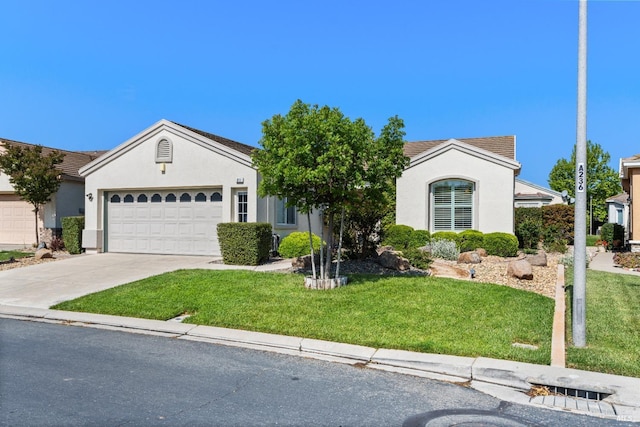 811 Inverness Dr, Rio Vista, CA 94571 - single story home with stucco siding, an attached garage, driveway, and a front lawn
