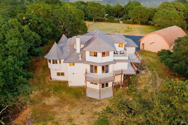 aerial view with a wooded view