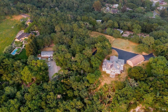 aerial view featuring a view of trees
