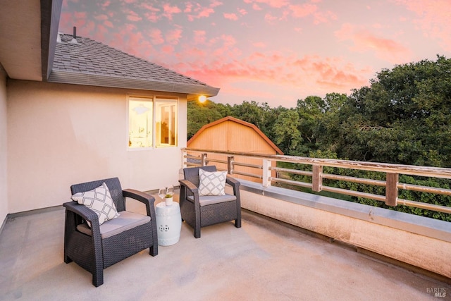 view of patio / terrace featuring a barn