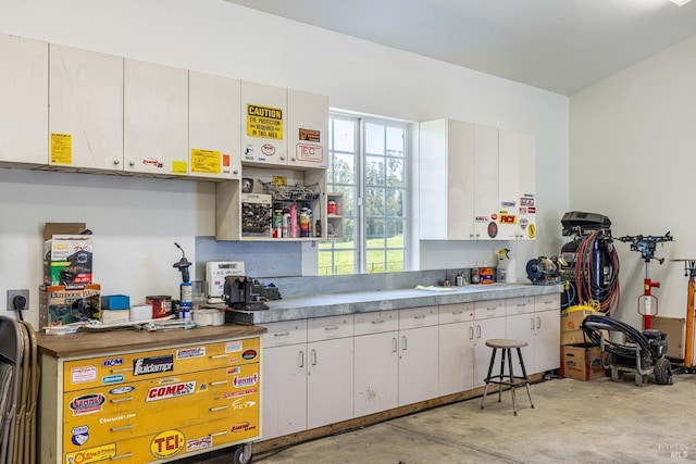 3785 Roblar Rd, Petaluma, CA 94952 - kitchen featuring concrete floors, white cabinets, and light countertops