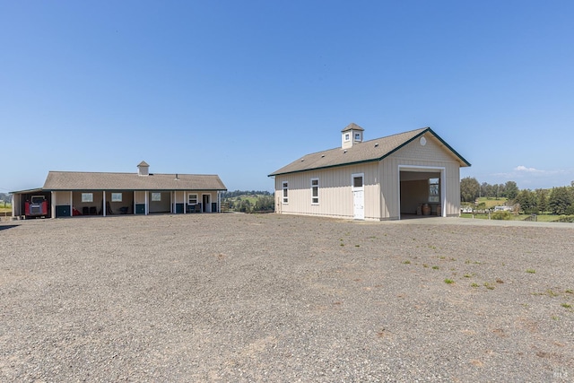 3785 Roblar Rd, Petaluma, CA 94952 - rear view of house with a detached garage and an outdoor structure