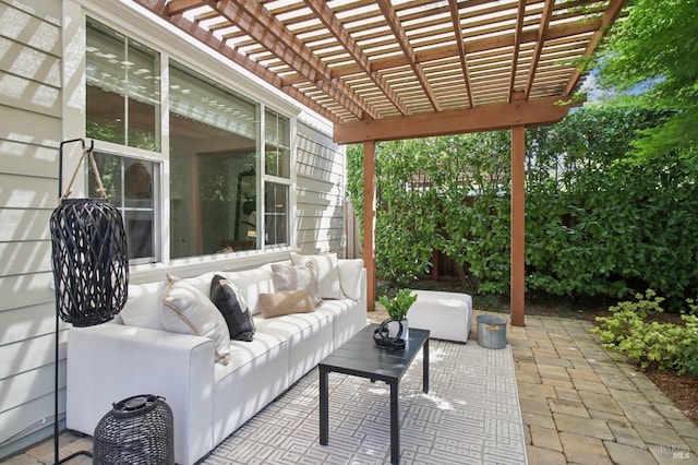 view of patio featuring an outdoor hangout area and a pergola
