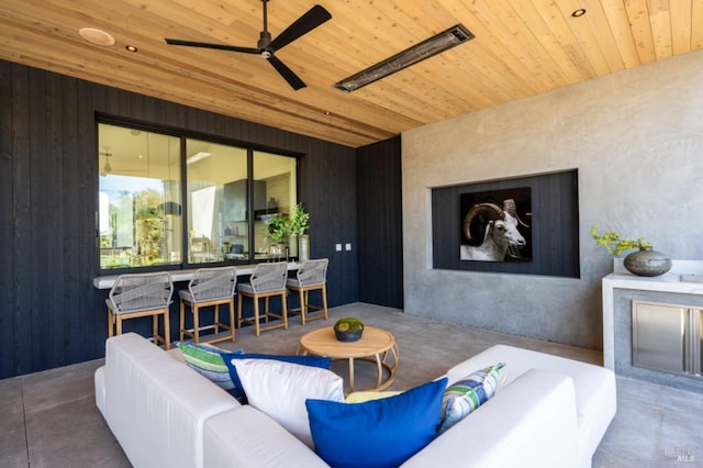 view of patio / terrace with ceiling fan and outdoor lounge area