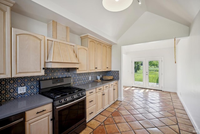 kitchen featuring gas range, light brown cabinetry, tasteful backsplash, dishwasher, and premium range hood