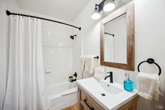 full bathroom featuring vanity and shower / bath combination with curtain