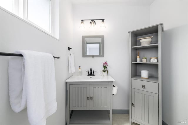 bathroom featuring tile patterned floors and vanity