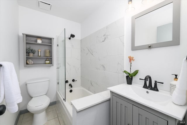 bathroom with visible vents, shower / washtub combination, vanity, tile patterned floors, and toilet
