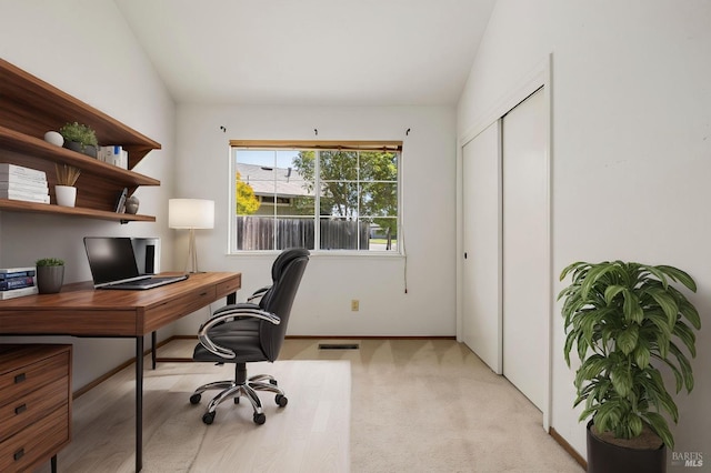 office area featuring visible vents and baseboards