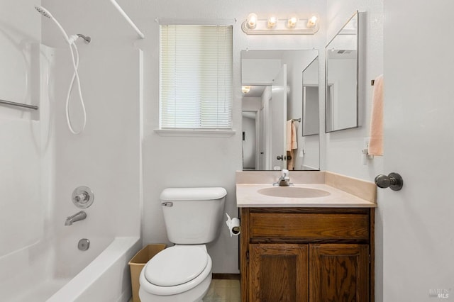 full bath with vanity, toilet, and shower / tub combination