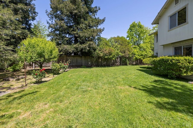 view of yard with fence