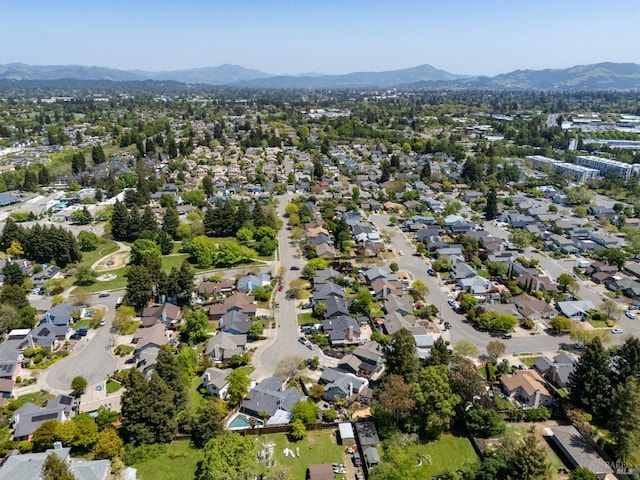 bird's eye view with a residential view and a mountain view