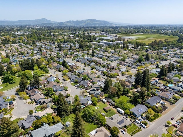 drone / aerial view with a residential view and a mountain view