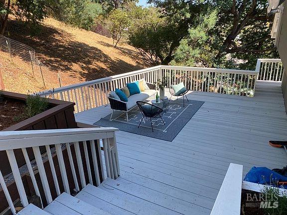 15 Main Dr, San Rafael, CA 94901 - wooden terrace featuring an outdoor living space