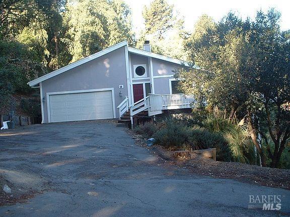 15 Main Dr, San Rafael, CA 94901 - view of front of property featuring stucco siding and a garage