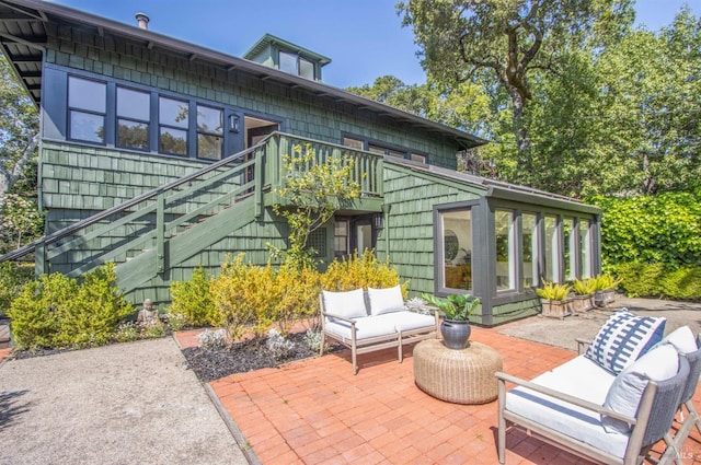 45 Laurel Grove Ave, Kentfield, CA 94904 - rear view of property featuring a patio, outdoor lounge area, and stairway
