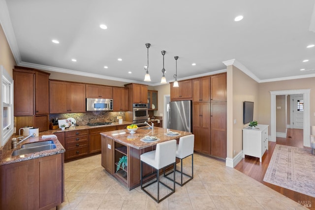190 Franklin St, Napa, CA 94558 - kitchen featuring appliances with stainless steel finishes, brown cabinets, light stone counters, decorative backsplash, and a kitchen bar