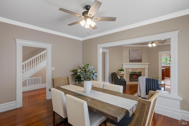 190 Franklin St, Napa, CA 94558 - dining room with a ceiling fan, ornamental molding, dark wood finished floors, a premium fireplace, and baseboards
